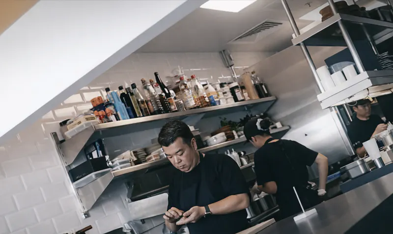 Chefs working the open kitchen at Reif Japanese Kushiyaki