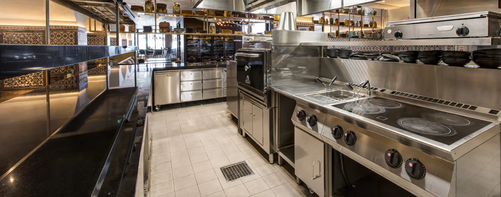 Cooking line with ranges and ovens at Ruya Restaurant