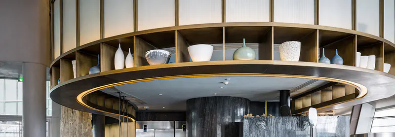 Circular bar with overhead shelving at Sean Connolly Restaurant