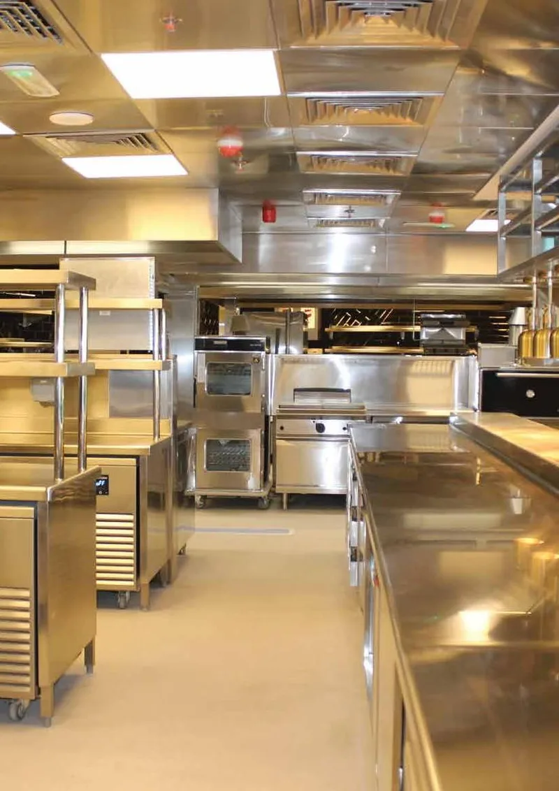 Kitchen with combi ovens and refrigerated counters at BU Burgeronomy