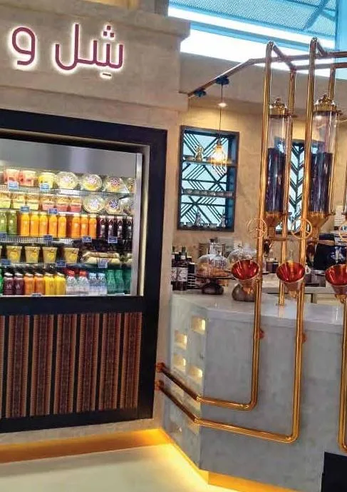 Café counter with copper cold-brew towers at Sikka Cafe