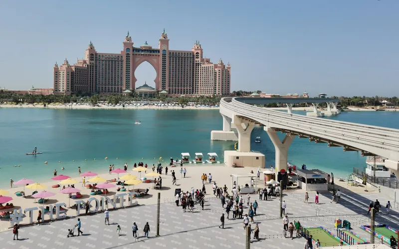 Atlantis The Palm exterior seen across the lagoon from The Pointe, 2023